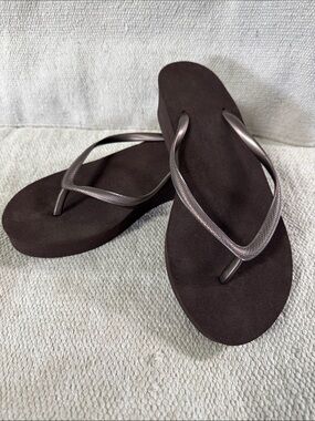 Women's Brown Flip Flop Sandals with bronze straps